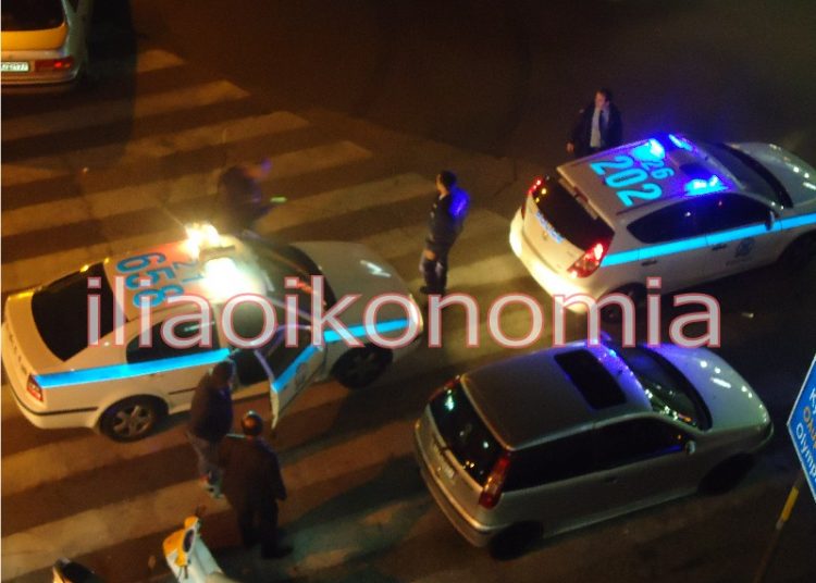 Ομάδα με κράνη και ρόπαλα προκάλεσε ζημιές στο κέντρο του Πύργου πριν λίγο (νεώτερη ενημέρωση 22:19)